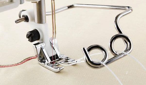 Лапка с направителем для нашивания 2-х шнуров undefined